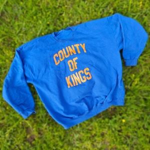 county of kings blue and orange crewneck sweatshirt